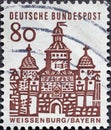 GERMANY - CIRCA 1964: a postage stamp from Germany, showing buildings in Germany. The Ellinger gate in WeiÃÅ¸enburg in Bavaria